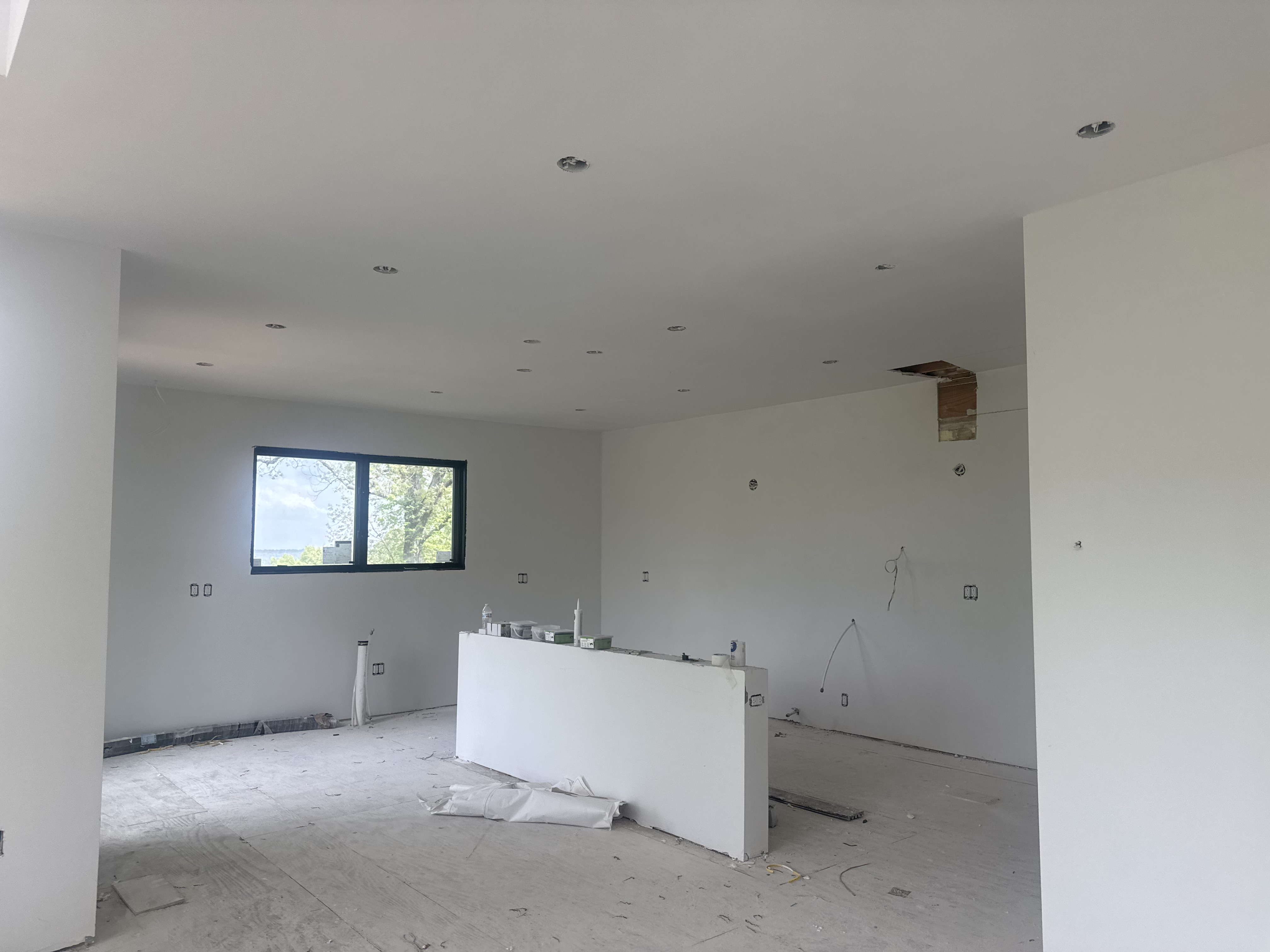 Finished drywall and kitchen rough-in